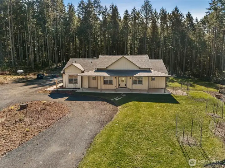 Nearly brand new 4 bedroom home on 1.75 acres! Beautiful pocket of privacy with fully fenced back yard, fruit trees, blueberries, raspberries. No HOA. Private well.