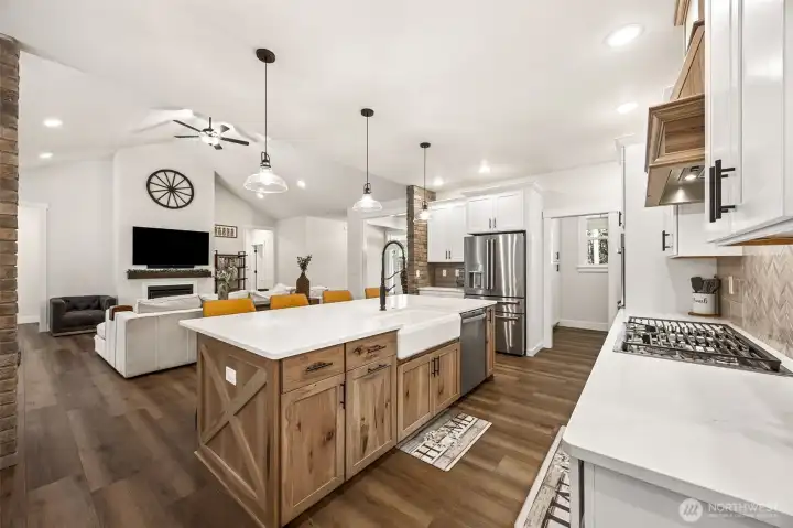 Connect and have conversations between the kitchen and family room. Modern farmhouse style! Butler's Pantry is right of fridge has a pocket door.