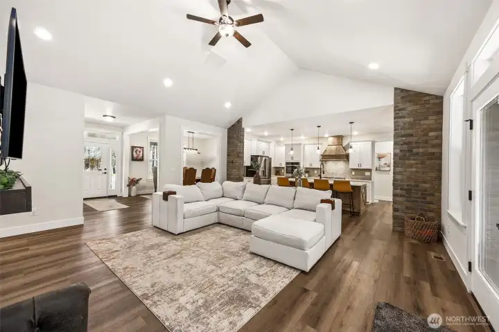 From family room looking toward main entry, dining room and kitchen.