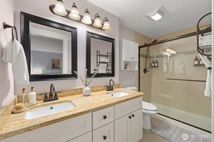 Primary bathroom is virtually staged