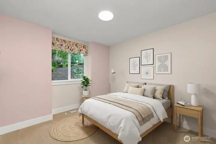 One of 2 main floor bedroom is virtually staged