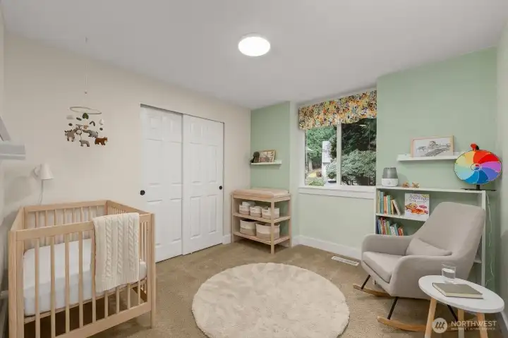 Another main floor bedroom is virtually staged