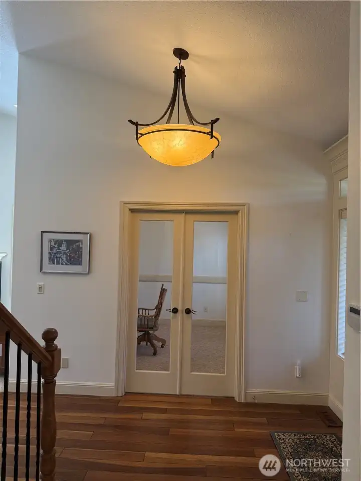 Entrance has a study with French doors to right as you enter. Coat closet is to the left side,