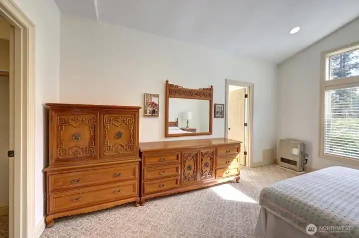 Furniture is available with the home if buyer wishes. Far door is to full bath. Door to the left is the walk-in closet.