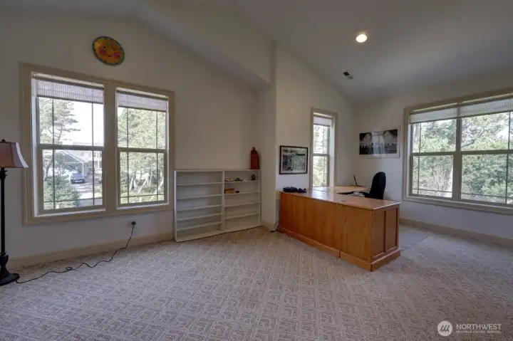 Upstairs is a huge room that can be used as an office, rec room or family room.