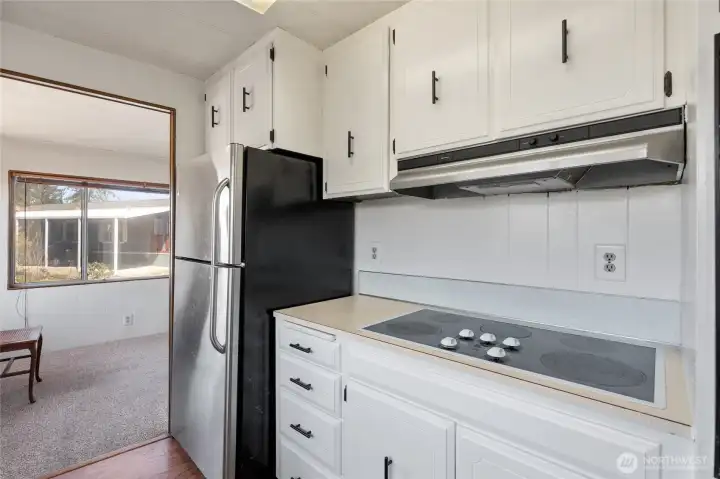 Check out the well-maintained original kitchen cabinets.