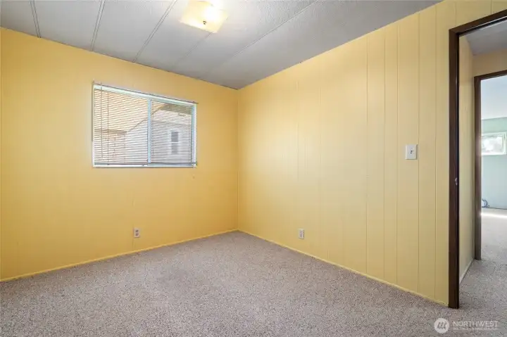 The secondary bedroom can support a queen-sized bed.