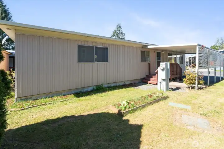 Enjoy easy access to the yard from the front and back of the house.