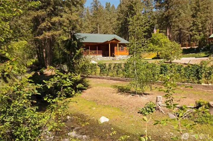 With a South-facing clearing in front of the home there is plenty of good garden space.