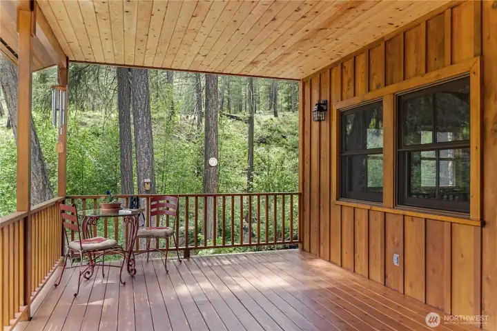 Covered porches on the front and back are great for al fresco dining with the sound of Libby Creek as a backdrop.