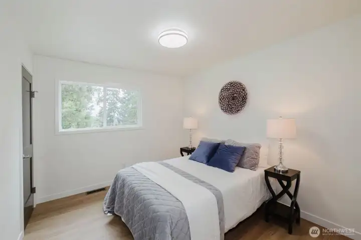 Bedroom 1, closet to the left of the photo.