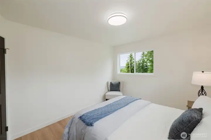 Another view of bedroom 3. This bedroom has a peek a boo view of the moutains.
