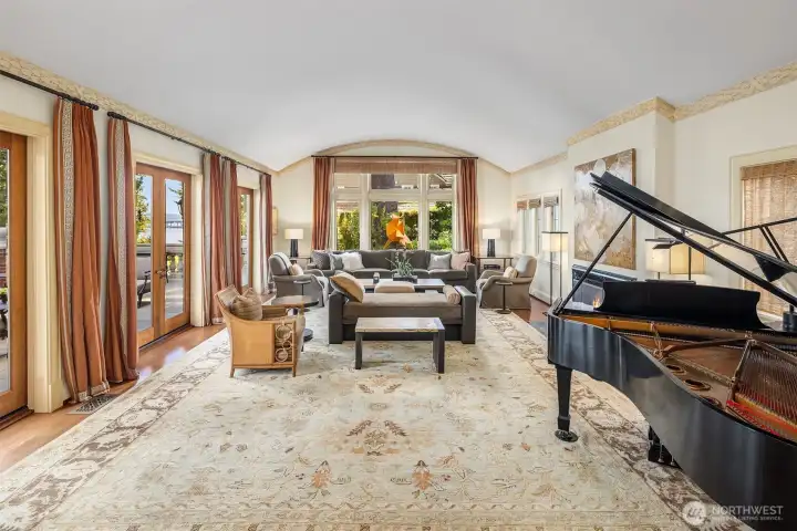 The expansive living room with fireplace provides a perfect gathering space. The expansive living room with fireplace provides a perfect gathering space.