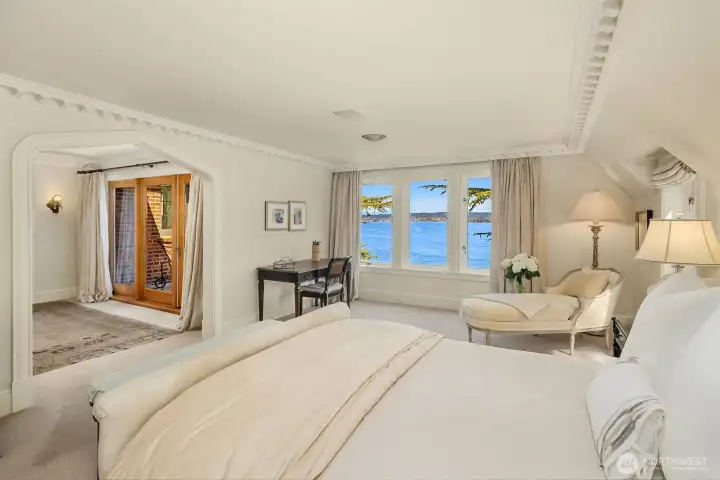 Upstairs enjoy the primary suite with private balcony and sweeping views. Upstairs enjoy the primary suite with private balcony and sweeping views.