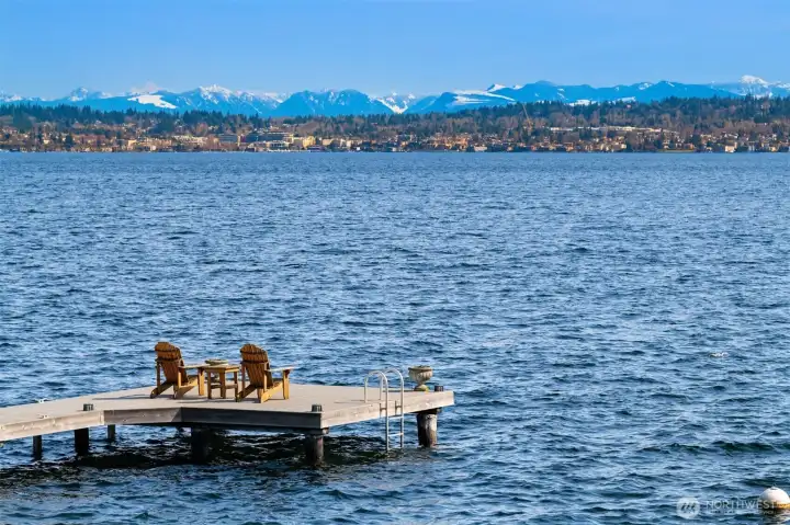 Sit on the dock and take in the sweeping city, lake and mountain views. Sit on the dock and take in the sweeping city, lake and mountain views.