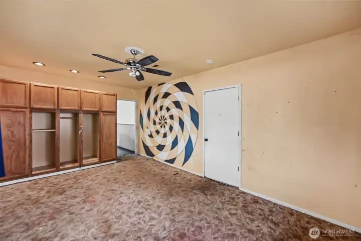 Another view of the bonus room, door leads to the garage.