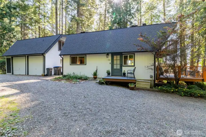 Updated with newer roof, gutters, paint, decks, plumbing, insulation, kitchen and bathrooms!