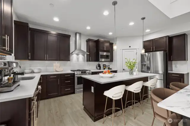 Dining area + kitchen with eating space *virtually staged*