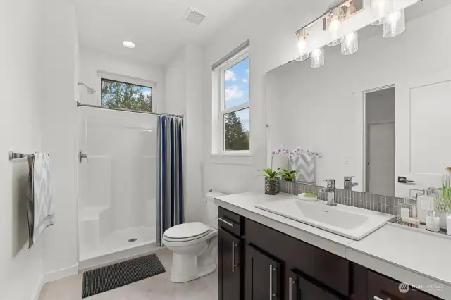 Ensuite bathroom (lower level) *virtually staged*