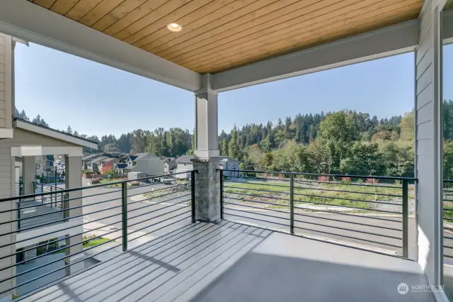 Enjoy sunny Western views of evergreen trees and sunsets from the large, covered deck.