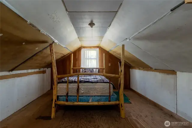 upstairs room with a lot of space/shelves