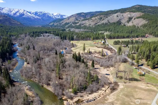 Dynamic setting with mountain views and river