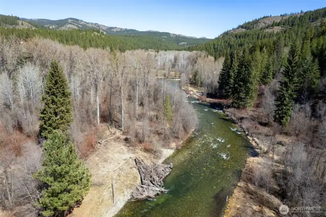 Property includes both land on both sides of the river