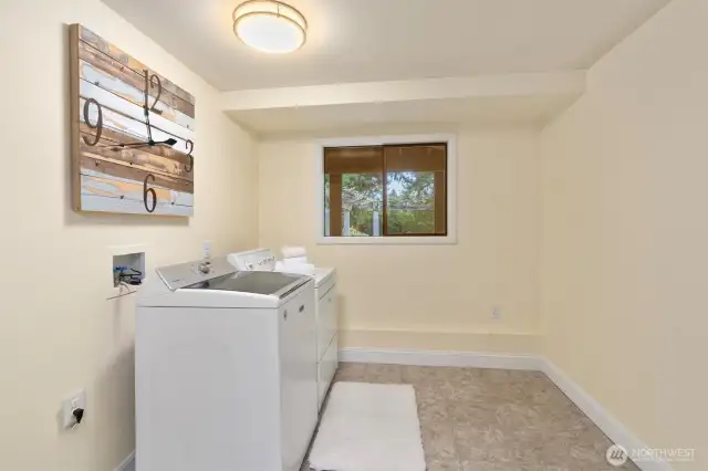 Large laundry room on lower level.