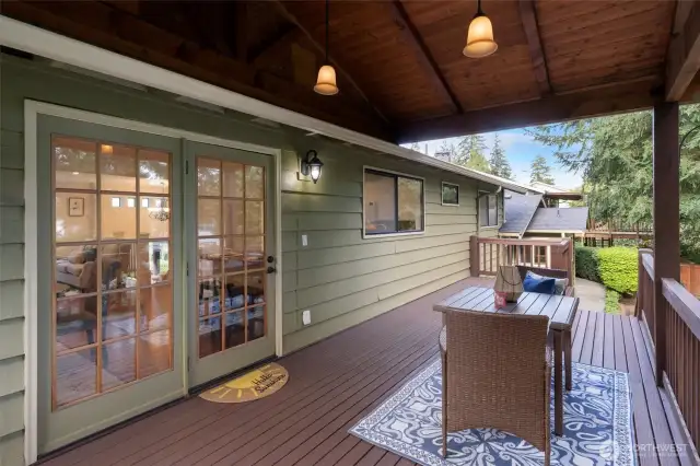 Enter covered deck from dining area.