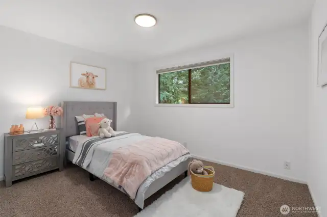 Bedroom 1 is located across from Primary bedroom.
