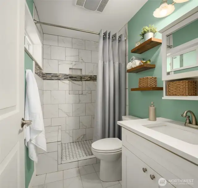 Primary Ensuite with Walk-in Shower and Open Shelving