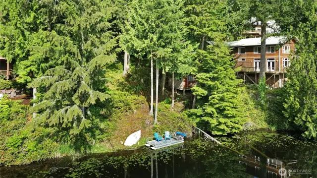 Welcome to Ames Lake! 50ft of private waterfront is waiting for your dream home to be built.