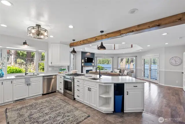 Another view of the kitchen with large window over the sink.