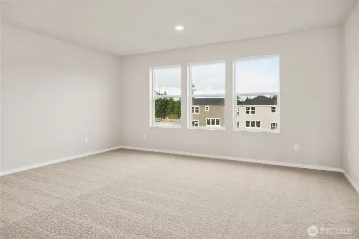 Primary Bedroom. Photos of previously built home of same floorplan. Colors, Specifications, and Options may vary on actual home.