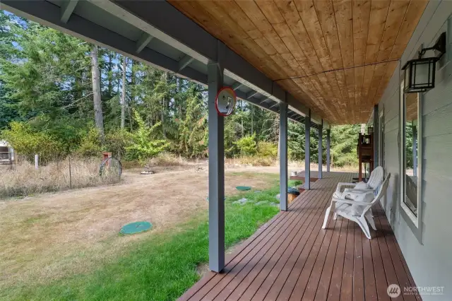 French doors lead to the wrap-around covered porch, which is the perfect spot to relax, entertain or watch the birds & wildlife!