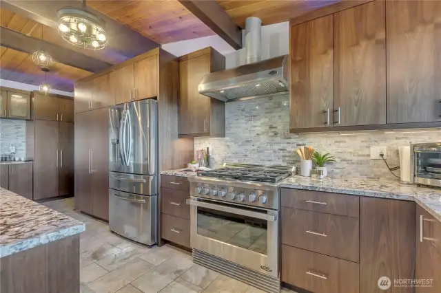 Chef's Kitchen with 3 pullout cabinetry pantries.