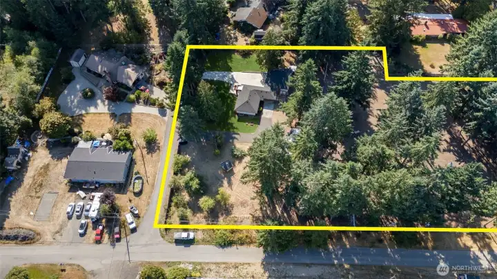 Almost 2-1/2 acres! Includes sunny spaces and tree-drenched areas too.