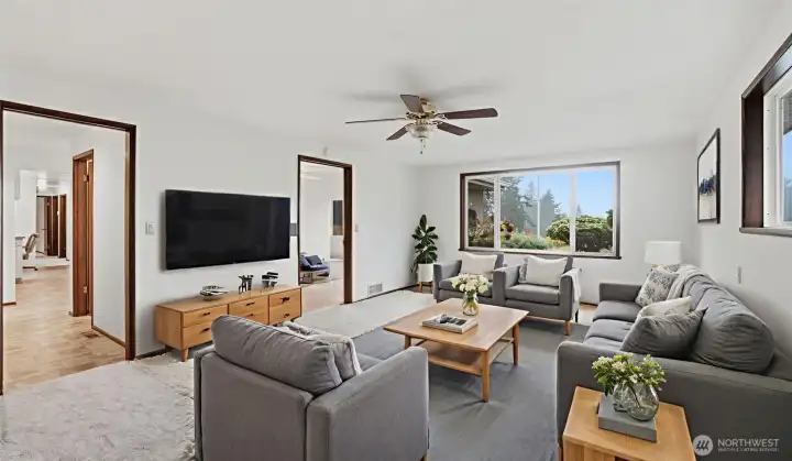 Bright and inviting living room, virtually staged to showcase the room’s spacious layout and natural light.
