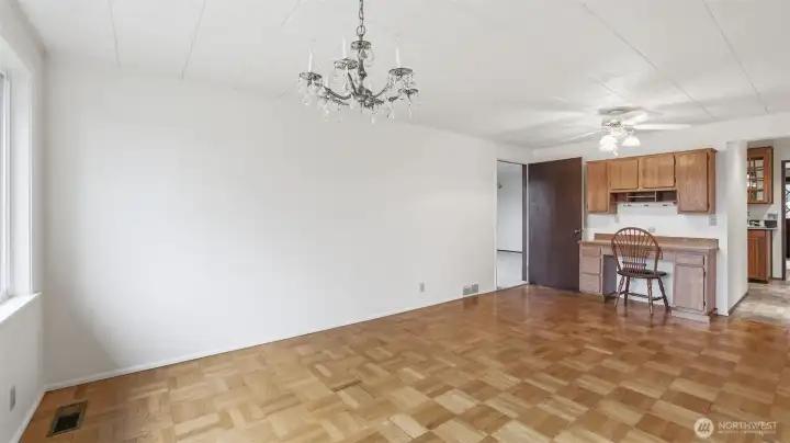 Open dining space offering multiple layout possibilities and easy flow to the kitchen.