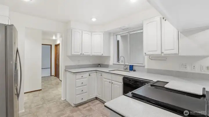 Open kitchen with spacious counters and a bright, easy-to-navigate layout.