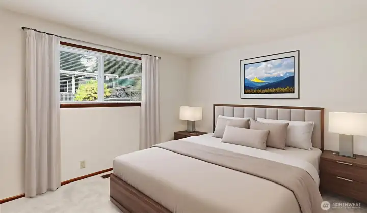 Soft, neutral virtual staging brings this spacious primary bedroom to life and highlights its calming atmosphere.