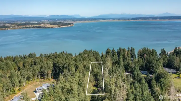 Across from the water.