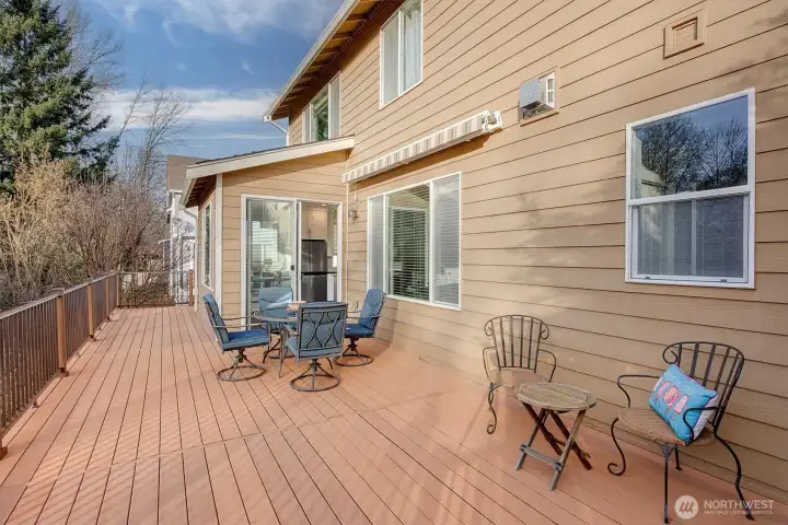 One of 2 ABUNDANT in size, terra-tech, low maintenance decks with remote awning for outside, extended dining and entertaining fun! Sunsets galore....surrounded by nature, not....other homes. This home lives so beautifully, inside and out!