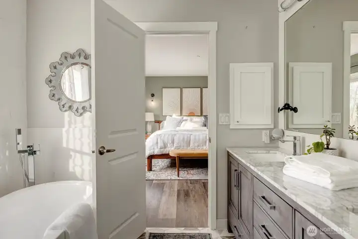 Private, peaceful and beautifully appointed is the primary suite of this wonderful home in Kennydale.