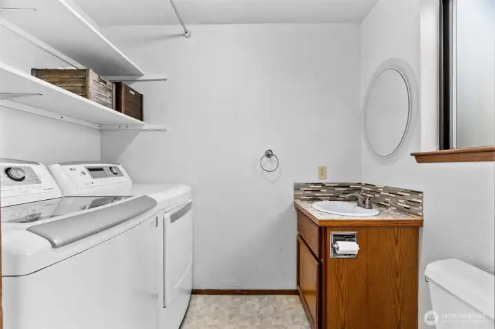 Washer and Dryer included in the sale!  Plenty of shelving for staying organized.