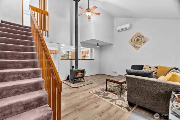 Up the stairs to the primary and third bedroom.