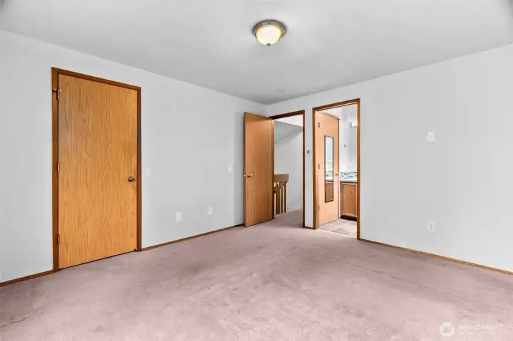 Primary attaches directly to upstairs full bath.