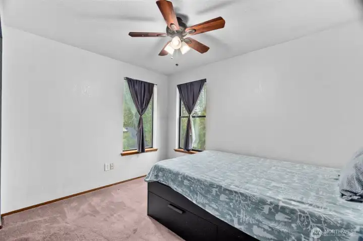 Third bedroom, also with corner windows.