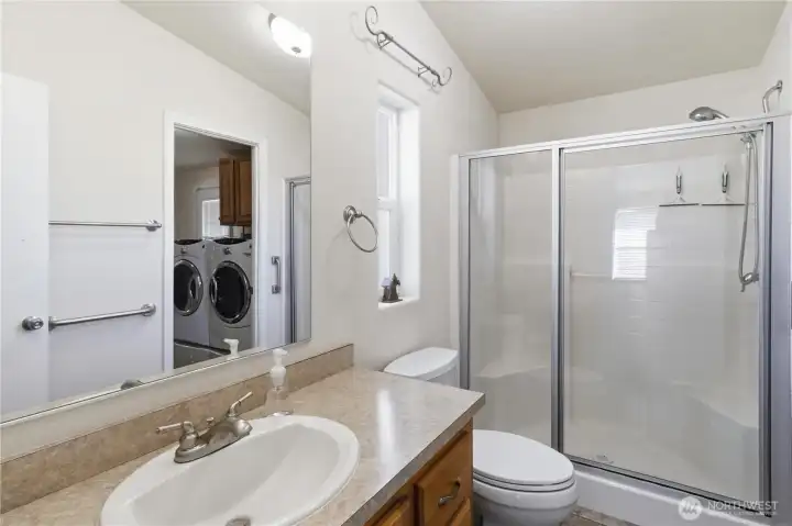 Primary room bathroom, connected to Laundry room