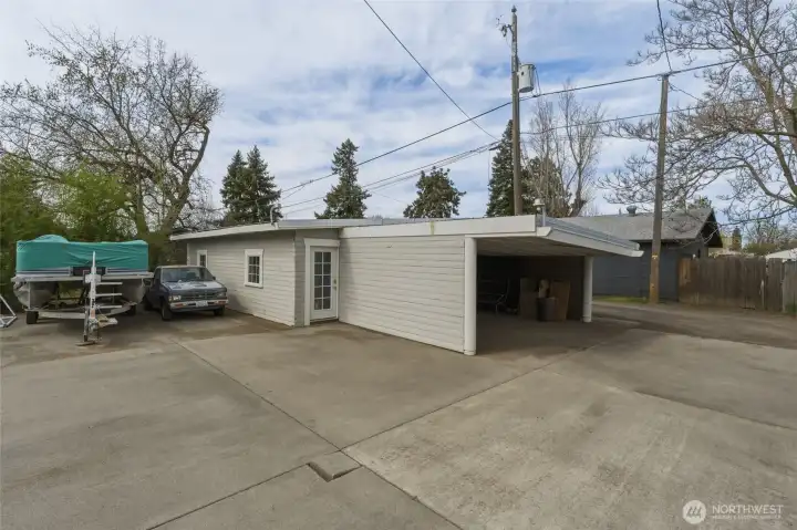 Carport attached to garage/shop